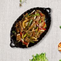 Black Pepper Ginger Beef · Stir-fried marinated beef, onions, mushrooms, bell peppers, green onions, black pepper, ging...