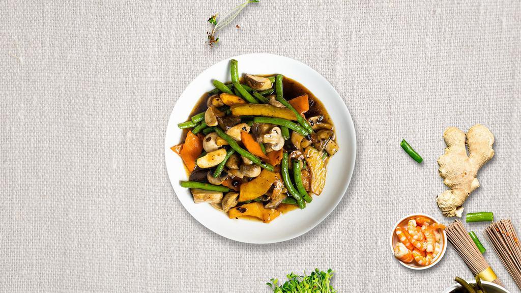 Vegetable Lover · Stir-fried mixed vegetables, mushrooms, and garlic in our house stir-fry brown sauce. Served with your choice of rice.