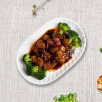 General Chicken · Crispy chicken breast, steamed broccoli, steamed carrots topped with our house-made sauce an...