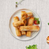 Crispy Spring Roll (4 Pcs) · Deep-fried house-made vegetarian spring rolls. Served with sweet chili sauce.