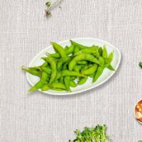 Edamame · Steamed young soybeans in pods, sprinkled with pure Himalayan salt.