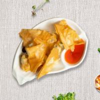 Wontonster · Deep-fried wonton wraps filled with cream cheese, carrot, onion, and celery. Served with our...