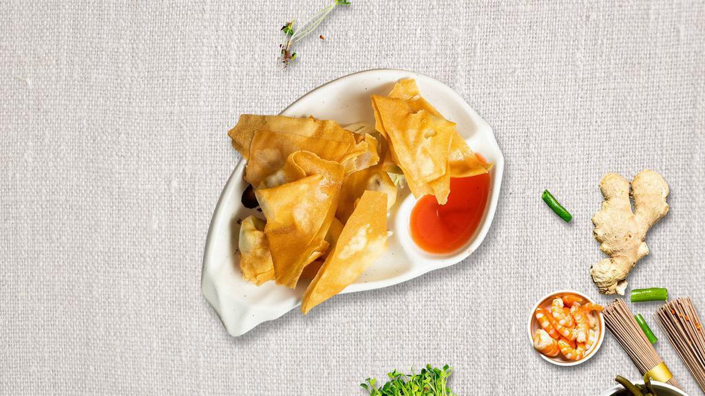 Wontonster · Deep-fried wonton wraps filled with cream cheese, carrot, onion, and celery. Served with our house-made sweet-chili sauce.