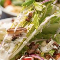 Wedge · Romaine Lettuce, Gorgonzola, Schreiner’s Smoked Bacon, Dates, Tomato, Shaved Red Onion + Ranch