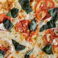 Margherita Pizza · Fresh Mozz, Roasted Tomato, Basil + EVOO