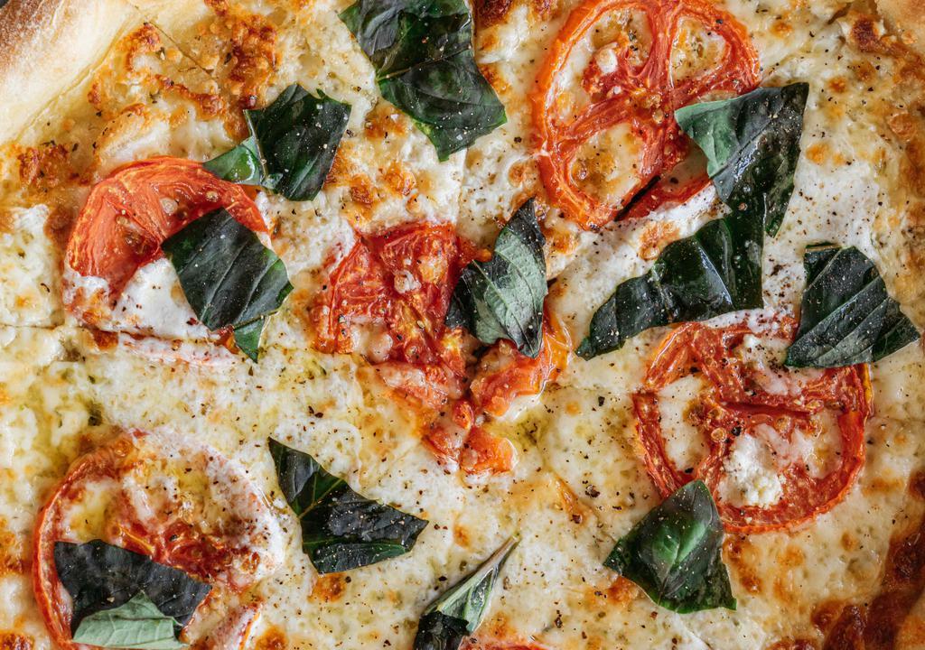Margherita Pizza · Fresh Mozz, Roasted Tomato, Basil + EVOO
