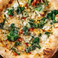 At Last Pizza · Broccolini, Roasted Corn, Goat Cheese, Calabrian Chilis, Basil + Lemon Oil