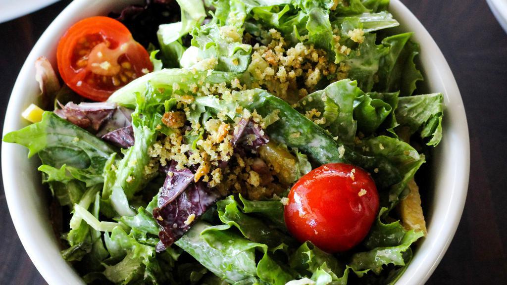 Great Little Salad · Mixed Greens, Tomatoes, Brussels, Golden Beets, Herb Breadcrumbs + Lemon Vinaigrette*