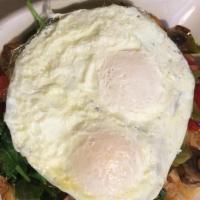 Veggie Skillet · Spinach, mushrooms, bell peppers, onions and tomatoes with hollandaise sauce topped with two...