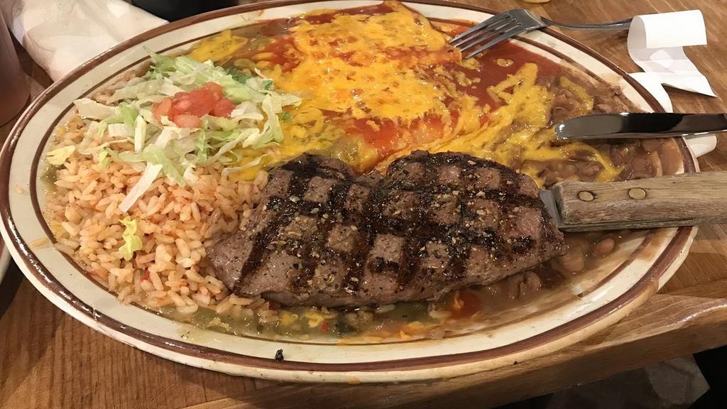 Steakalada · 8 oz. sirloin served with choice of two rolled cheese, chicken or beef enchiladas topped with red or green chile and melted cheese.