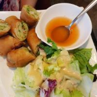 Crispy Veggie Rolls (3) · Vegetarian spring roll with duck sauce.