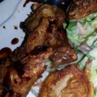 Eest Wings (8) · Deep-fried chicken wings with special house recipe.