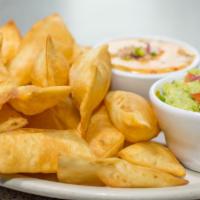 Blue Bonnet Platter · Guacamole, queso, and flour tortilla chips - Queso is made with pork green chili.
