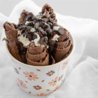 Rocky Mountain Ice Cream · Chocolate base, PB cups, oreo chocolate chips, chocolate drizzle and whip cream.