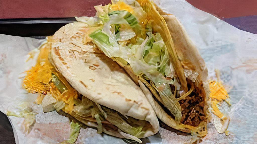 1 Taco And 1 Gordita · Include rice and beans.