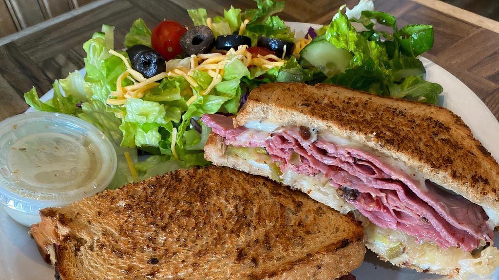 Reuben · Includes your choice of fries, soup or salad.