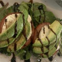 Avocado Salad · Fresh Mozzarella, avocado, tomatoes and mixed greens