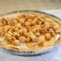 Caramel Cheesecake Pie · A decadent graham cracker crust with  Cheesecake frozen yogurt, topped with delicious cheese...