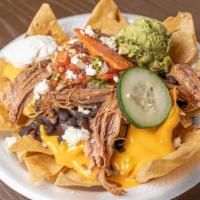 Nachos Meal · Corn chips topped with your choice of protein, beans, mozzarella cheese, sour cream, queso f...