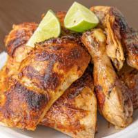 2 Whole Chicken Family Pack · Served with three sides, tortillas and salsa.