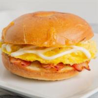 Ham Egg And Cheese Bagel · Ham, egg, cheddar, cream cheese, mayo.
Please note: sausage is not an option. It only comes ...
