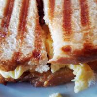 Breakfast Bistro Panini · Cream cheese, bacon, egg, apples.
Please note: no meat substitutions.