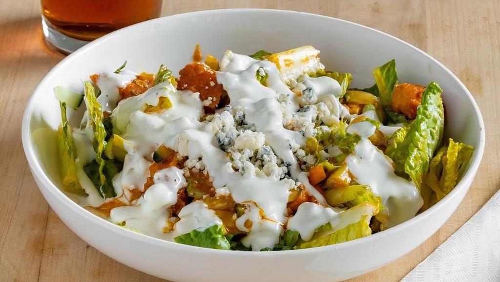 Ma Candy'S Buffalo Chicken Salad · Buttermilk breaded chicken tossed in buffalo sauce, gorgonzola crumbles, cucumbers, chopped carrots and celery, all on a bed of romaine lettuce and topped with bleu cheese dressing.