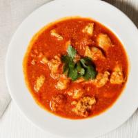 Chicken Curry · A traditional dish of Nepal carefully seasoned with an exotic blend of curry spices.