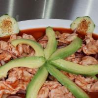 Aguachile Rojo / Shrimp Marinated In Lime And Red Sauce · Shrimp Marinated in Lime sliced  in butterfly cut. Mix with Cucumber and Onion  and  Red Sau...