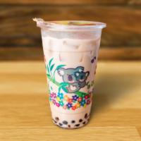 Classic Milk Tea · (24 oz.) Classic milk tea served with black tapioca pearls sweetened with agave nectar over ...