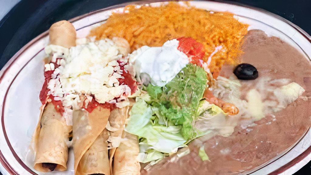 Taquitos Rancheros · Three crisp com tortillas filled with your chicken or shredded beef, served with lettuce, pico de gallo sour cream, guacamole, mild salsa and queso fresco.