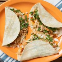 Street Tacos · Authentic street tacos with fresh corn tortilla topped with fresh onions, cilantro, and home...