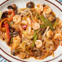 Camarones Mexicanos · Sautéed shrimp with mushrooms, onions, and green peppers. Served on a bed of rice with melte...