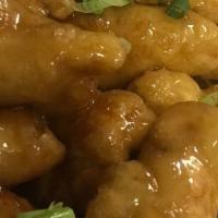 Crispy Honey Chicken Or Shrimp · Lightly battered  chicken in our  tangy honey sauce sprinkled with green onion over a bed of...