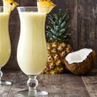 Passion Pina Colada · Fresh Banana, Pineapple, Pina Colada, Coconut Milk, and Choice of Protein.
(Contains Dairy a...