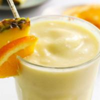 Tropical Fiesta · Fresh Banana, Pineapple, Kiwi, Orange Juice, and Choice of Protein.
(Contains Dairy)
(Non-Da...
