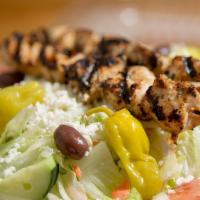 Greek Salad · Lettuce, onions, tomatoes, cucumbers, greek olives, feta cheese, pepperoncini, and house sal...