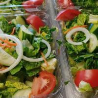 Spartan Chopped Salad · Lettuce, onions, tomatoes, cucumbers, greek olives, feta cheese, dill, green onions, celery,...