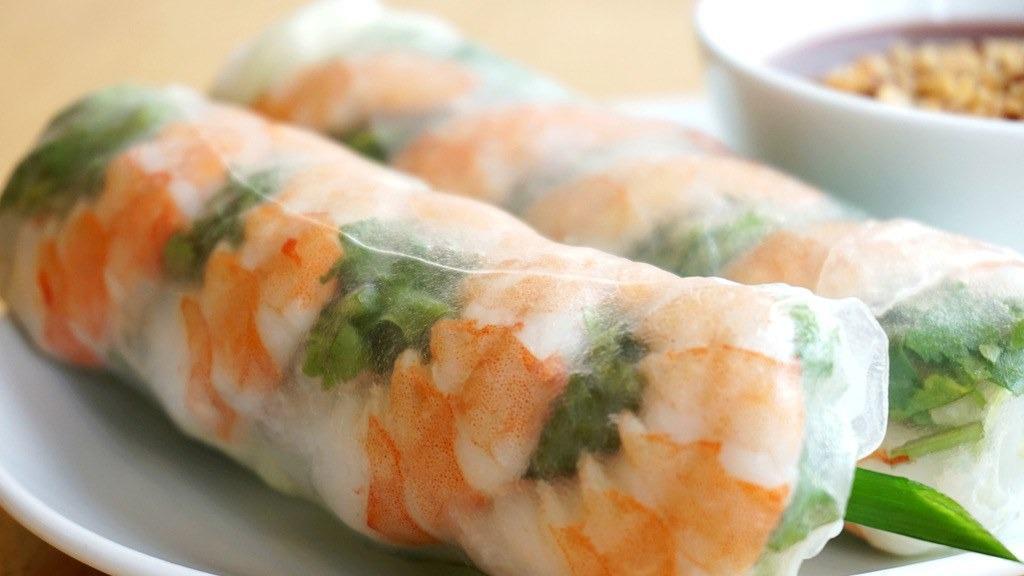 Goi Cuon (Spring Rolls) (2) · Choice of shrimp, shrimp and pork ham, grilled pork, grilled chicken or tofu rolled with lettuce, basil, and vermicelli noodle in fresh rice paper. Served with peanut sauce.