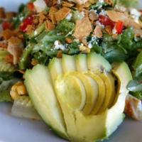 Southwest Chicken Chop · Chopped hearts of romaine, peppers, corn, feta, tortilla chips, avocado, pumpkin seeds, cila...