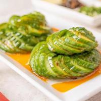 Sweet & Sour Cucumber 甜辣小黄瓜 · Cucumber salad with sweet and sour dressing.
