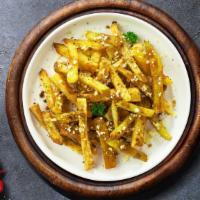 Tale Of The Garlic Parmesan · (Vegetarian) Idaho potato fries cooked until golden brown and garnished with garlic, salt, a...
