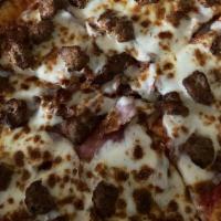 Large 15'' (8 Slice) Meat Lover'S Pizza · Pepperoni, salami, Canadian bacon and bacon smothered with mozzarella cheese and topped with...
