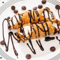 Chocolate Cannoli · Tube shaped shell of pastry dough filled with a delicious creamy.