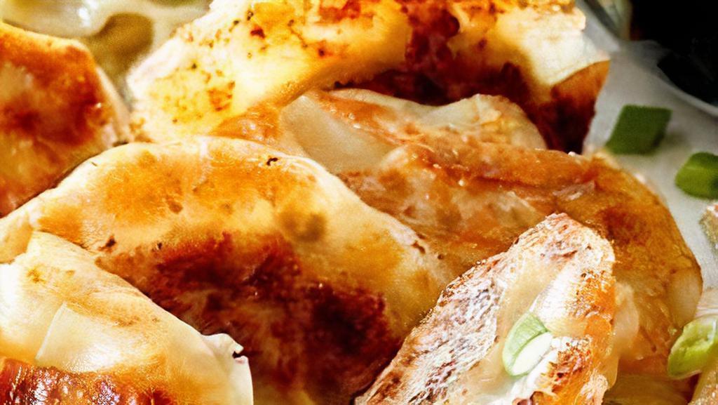 Deep Fried Potstickers (8) · Served with sweet chilli sauce.