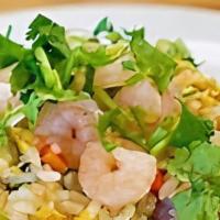 Seafood Fried Rice · With Chinese sauce carrots and peas.