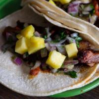Al Pastor Taco · Pork, Pineapple, Cilantro, Onion, Piña Salsa