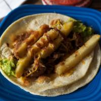 California Taco · Carne asada, potatoes, salsa, cheese, guacamole.