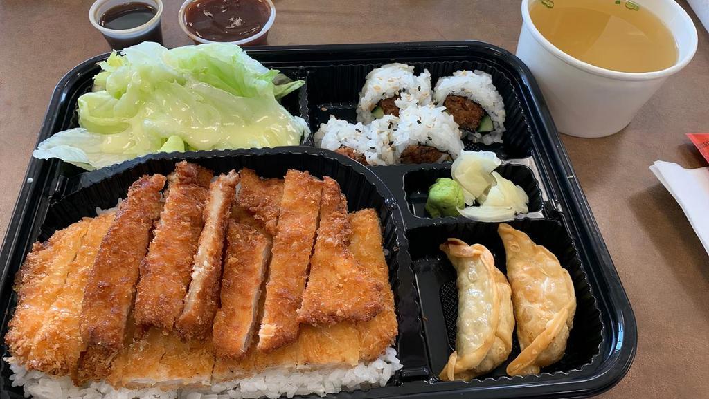 Chicken Katsu Bento Box · Chicken breast, panko breaded. Served with miso soup, salad, 2 pieces gyoza, and rice. 1 plus choice of the sushi bar.
