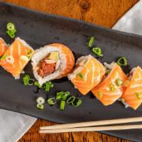 Love Special Roll · 8 piece spicy tuna, cooked shrimp, avocado. 
Top: fresh salmon.